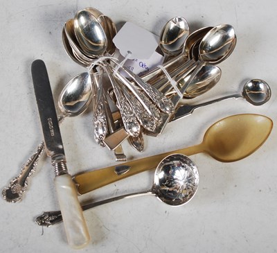 Lot 180 - A collection of assorted silver to include...