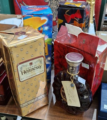 Lot 372 - Four bottles to include a Remy Martin XO...