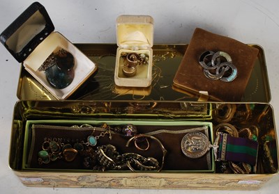 Lot 112 - A box of assorted costume jewellery to include...