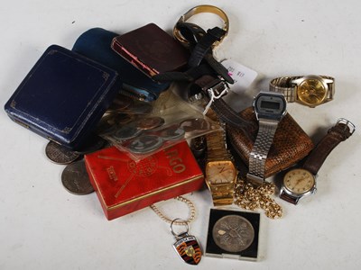 Lot 110 - A bag of assorted wristwatches, coinage,...