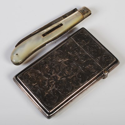 Lot 152 - An Edwardian silver card case, Birmingham,...