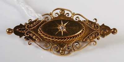 Lot 237 - A late 19th century 15CT gold brooch centered...