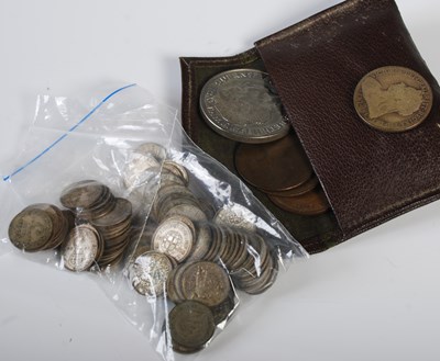 Lot 245 - A brown leather purse containing assorted 19th...