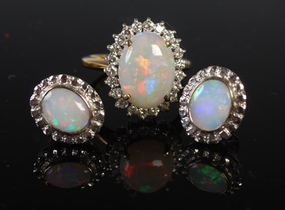 Lot 244 - A yellow and white metal opal and diamond set...