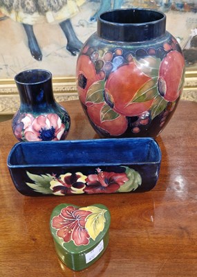Lot 30 - A group of four pieces of Moorcroft pottery to...