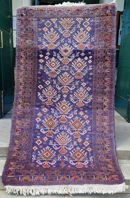 Lot 994 - A Persian rug, 20th century, the blue ground...