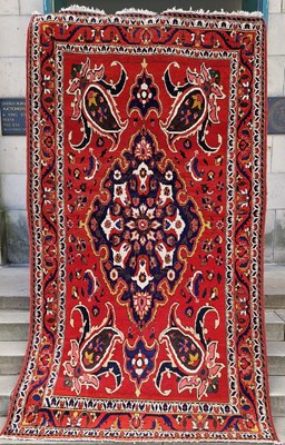 Lot 977 - A Persian rug, 20th century, the rectangular...