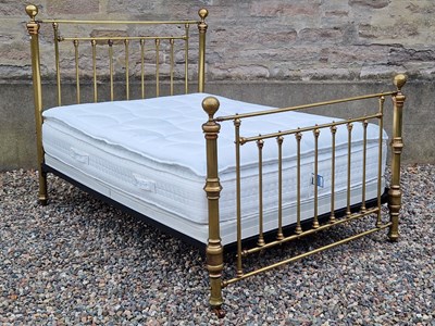 Lot 899 - A Victorian style double brass bed, the...