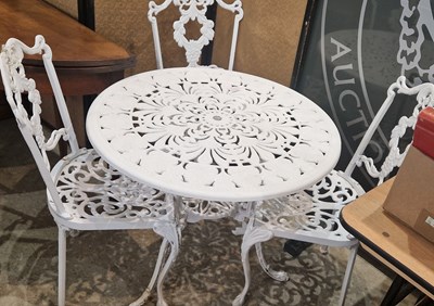 Lot 896 - A white-painted cast metal garden table and...