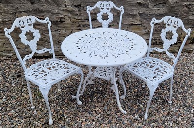 Lot 895 - A white-painted cast metal garden table and...