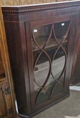 Lot 966 - A Georgian mahogany corner cupboard with...