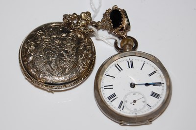 Lot 35 - A vintage white metal open-faced pocket watch...