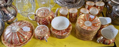 Lot 472 - A matched part teaset with some pieces bearing...