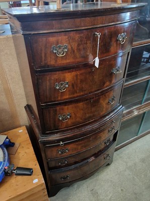 Lot 853 - A reproduction mahogany bowfront chest on...