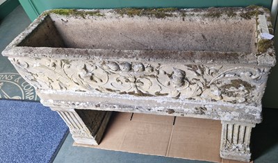 Lot 886 - A composite stone garden planter, the...