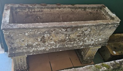 Lot 887 - A composite stone garden planter, the...