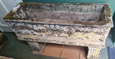 Lot 888 - A composite stone garden planter, the...