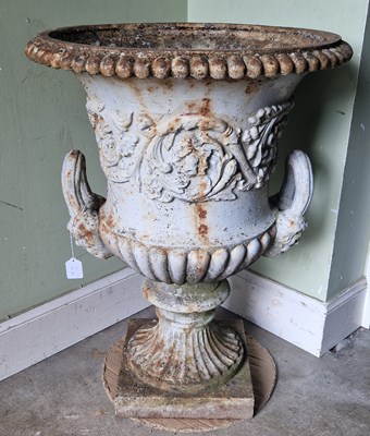 Lot 890 - A late 19th century cast iron garden urn, of...