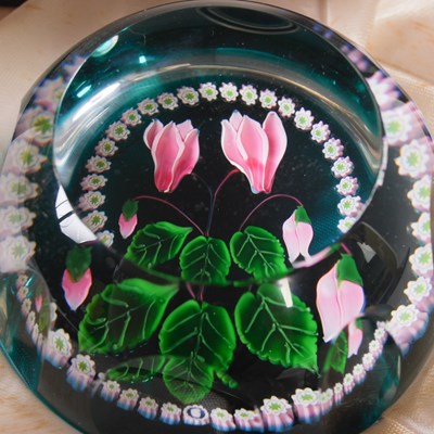 Lot 349 - Three assorted millefiori glass paperweights...