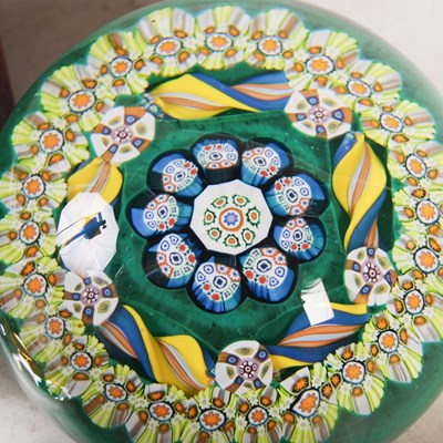 Lot 349 - Three assorted millefiori glass paperweights...
