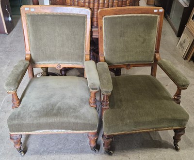 Lot 862 - A pair of Victorian oak club armchairs with...