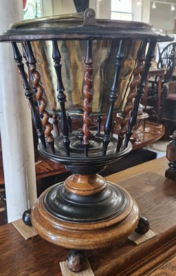 Lot 866 - A Dutch walnut and ebonised spindle bucket...