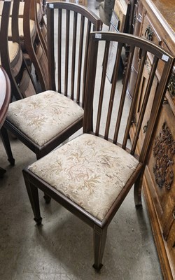 Lot 871 - A pair of mahogany and boxwood lined dining...