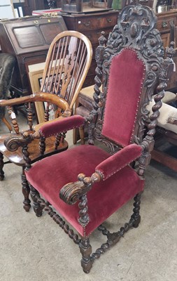 Lot 875 - An antique stained oak throne / hall chair, in...