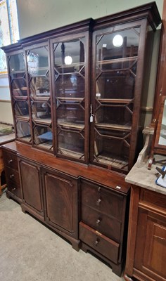 Lot 767 - A reproduction mahogany breakfront bookcase,...