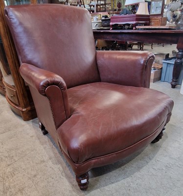 Lot 791 - A Victorian oak brown leather upholstered club...