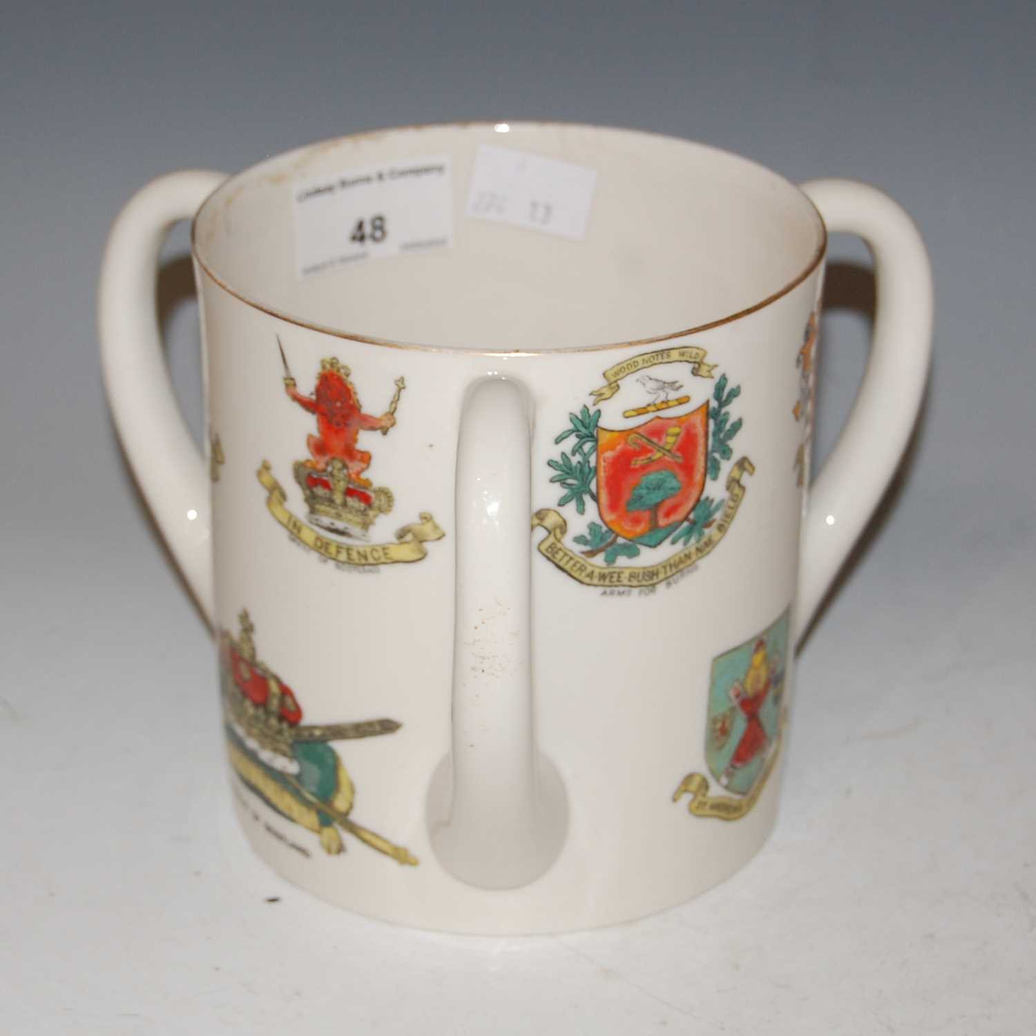 Lot 48 - A large 'WH Goss' tyg, decorated with regalia...