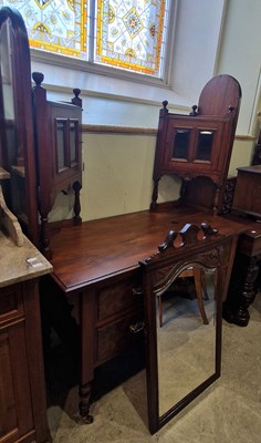 Lot 770 - An Edwardian walnut dressing chest with two...