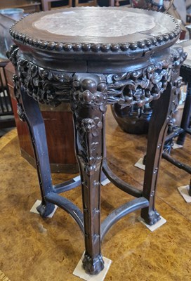 Lot 777 - A Chinese darkwood jardiniere stand, Qing...