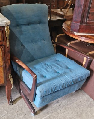 Lot 903 - A mid-century stained wood armchair with blue...