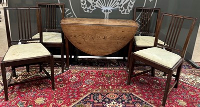 Lot 806 - A George III mahogany drop leaf table,...