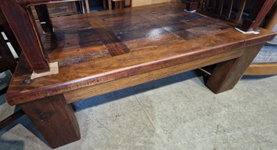 Lot 810 - A 20th century darkwood coffee table with...