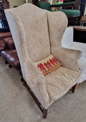 Lot 913 - A George III mahogany wing armchair with...