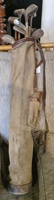 Lot 808 - A vintage canvas and leather trimmed golf bag...