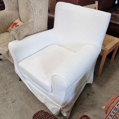 Lot 914 - An Ikea armchair on blondewood supports,...