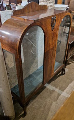 Lot 942 - An early 20th century walnut display cabinet...