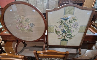 Lot 948 - A vintage needlework upholstered fire screen,...