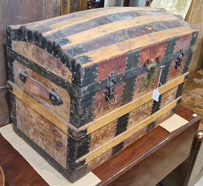 Lot 956 - A vintage wood, leather and metal bound dome...