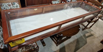 Lot 959 - A mahogany and clear glass table-top display...