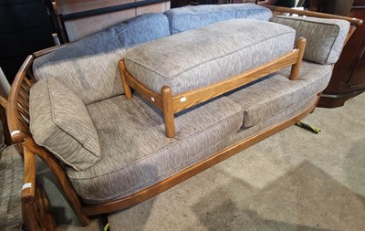 Lot 811 - A modern wood framed sofa, arm chair and...