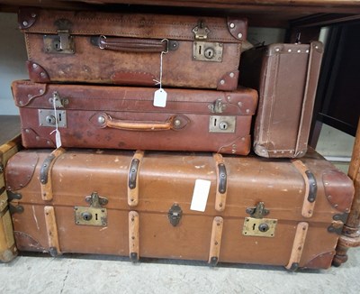 Lot 859 - A vintage leather suitcase bearing initials 'I....