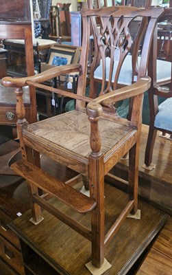 Lot 835 - An antique childs highchair in the George III...