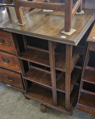 Lot 836 - An early 20th century oak revolving square...