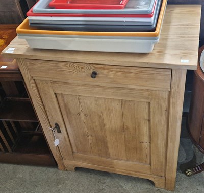 Lot 839 - A pine side cabinet fitted with single drawer...