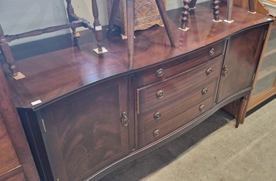 Lot 694 - A pine sideboard fitted with a bank of four...