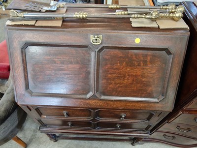 Lot 846 - An early 20th century stained oak fall front...